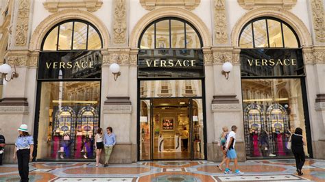 versace acquisizione|tapestry versace owner.